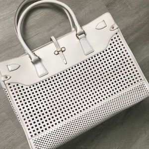 Salvatore Ferragamo bag. sheep skin. Red lining.